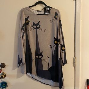 NWT Unique Asymmetrical hem blouse